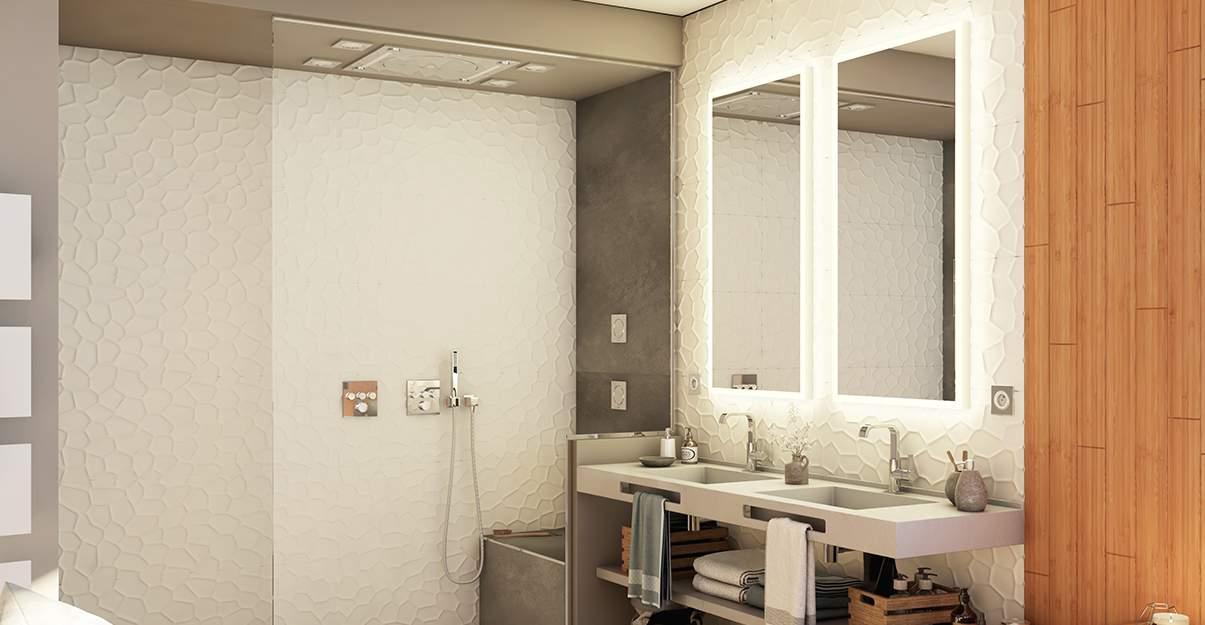 A bathroom with a large mirror Description automatically generated with medium confidence