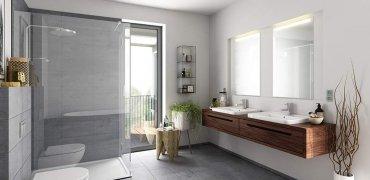 A bathroom with a glass shower Description automatically generated with medium confidence