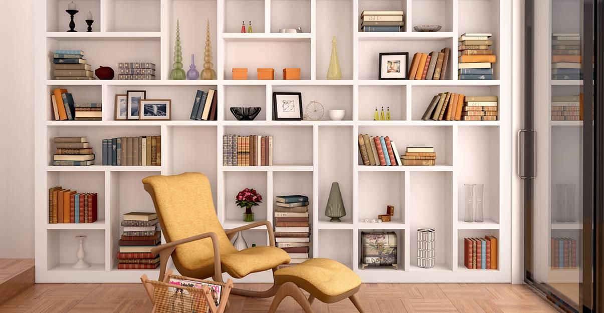 A room with shelves and a chair Description automatically generated with low confidence